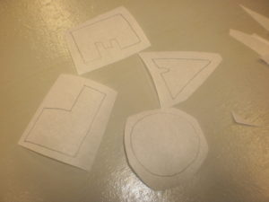 Cut out the shapes roughly with paper scissors.
