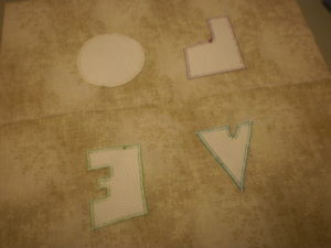 If you are going to embellish your appliques with some embroidery remove all of the Stitch-N-Tear. 